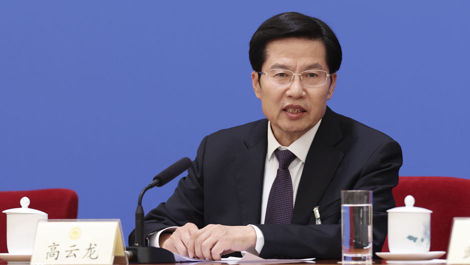 全國工商聯(lián)主席高云龍在記者會(huì )上